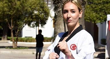 Kırık elle bronz madalya aldı