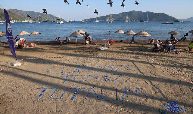 Plastik kapaklarla çevre mesajı