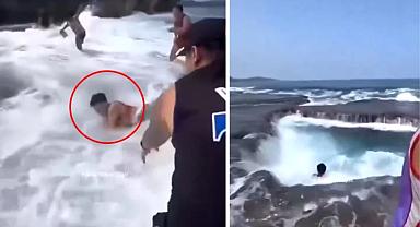 Dalgalar arasında yüzen adamı deniz yuttu