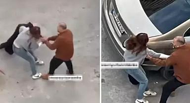 Kadını saçlarından tutarak zorla arabaya bindirmeye çalıştı