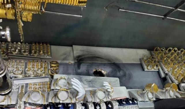 Bodrum katından duvar delerek girdiği kuyumcudan 10 kilogram altın çaldı
