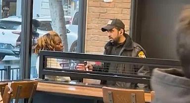 Güvenlik görevlisi, restorandan ayrılmak istemeyen kadına tokat attı